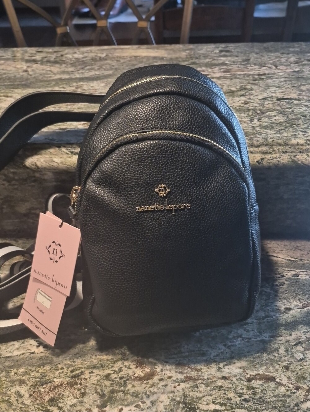 Nanette Lepore Black Pebbled Faux Leather 4-in-1 Mini Backpack with Gold Logo